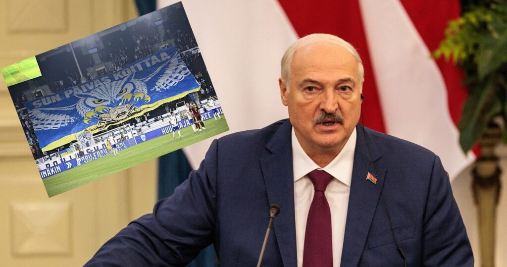 Kibice fińscy na meczu Finlandia - Białoruś z transparentem przeciw Łukaszence