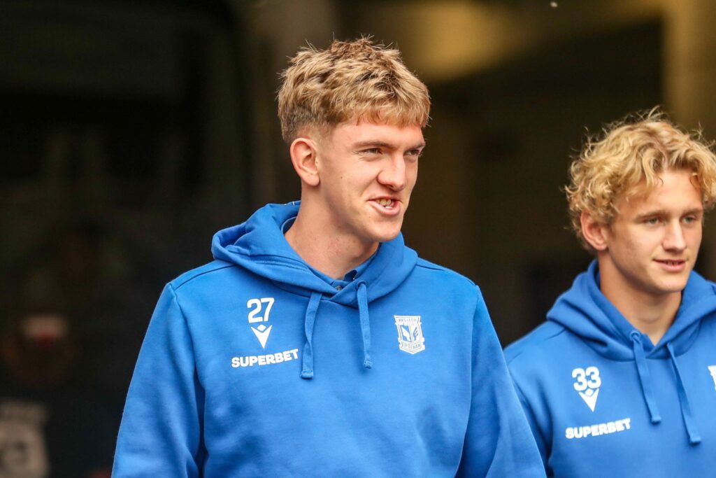 Wojciech Mońka w barwach Lecha Poznań podczas meczu piłkarskiego